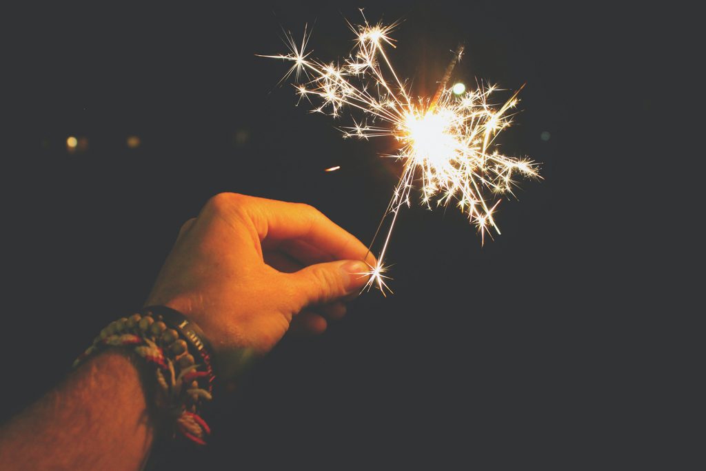 Hand holding sparkler